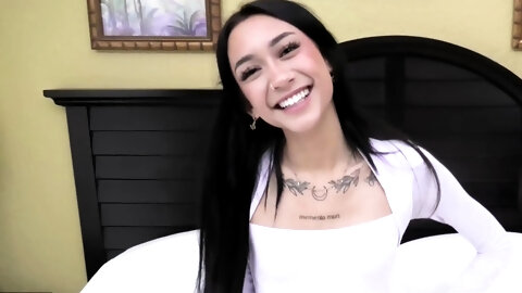 This super-petite exotic teen with a bald cunt sucks cock