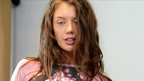 Fit solo model Elena Koshka spreads her long legs and masturbates