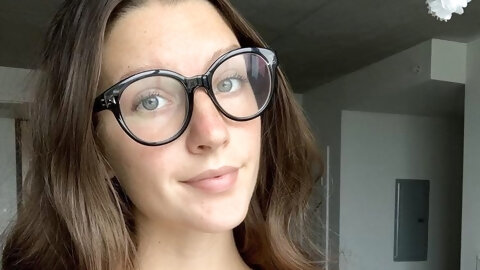 Glasses and tan lines.