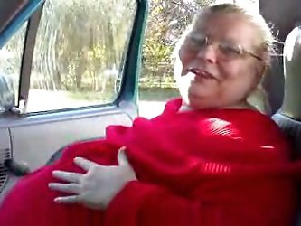 That disgusting morbidly obese granny is my wife's grandma. She pulls her red sweater up and starts playing with her ugly pale skin saggy tits.