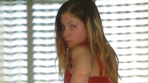 Emily 18 goes topless at home in her kitchen in a teasing manner